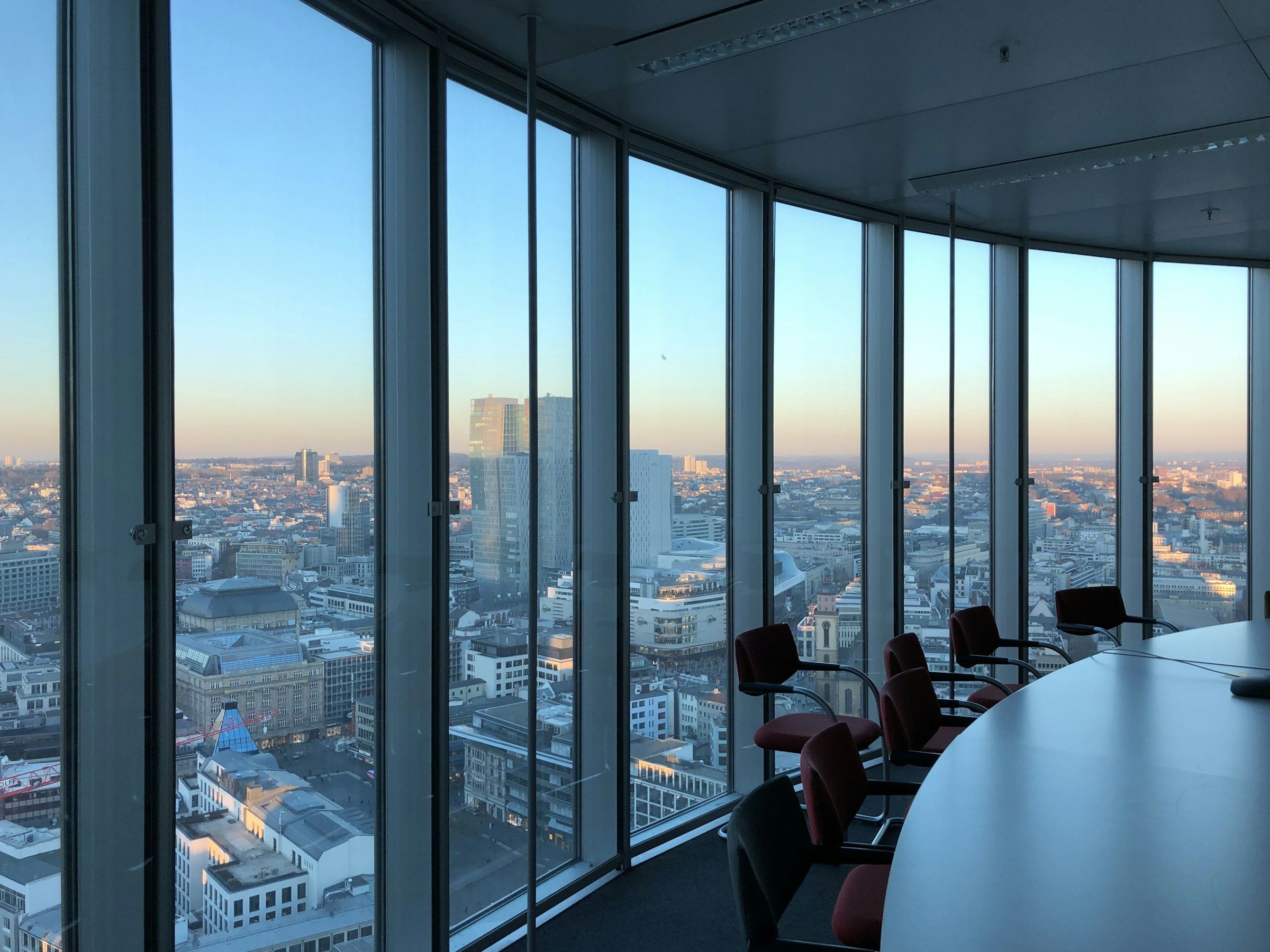 Boardroom overlooking the city at sunset